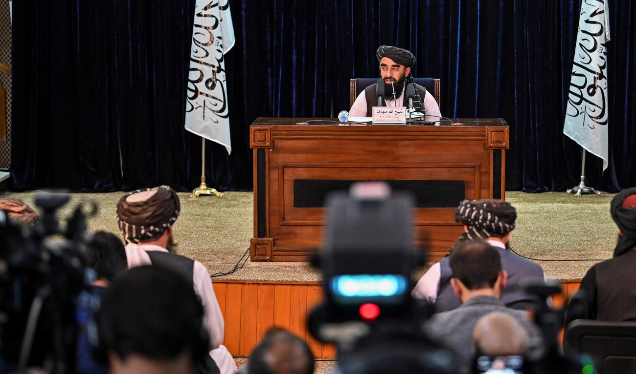 Taliban spokesman Zabiullah Mujahid addresses a press conference at government media and information center in Kabul city, on October 30, 2021. (AFP/File)