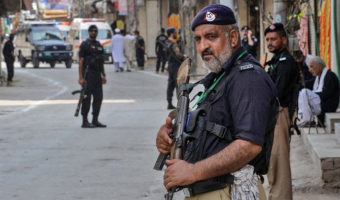 Police stands guard in Peshawar, Pakistan on August 7, 2022. (AFP/File)