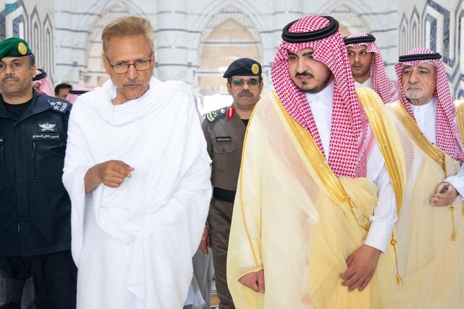 Deputy governor of the Makkah region Prince Badr bin Sultan bin Abdulaziz (right) receives Pakistan President Dr. Arif Alvi (left) as he arrives in Jeddah on June 25, 2023 ahead of the annual Hajj pilgrimage. (Saudi Press Agency)