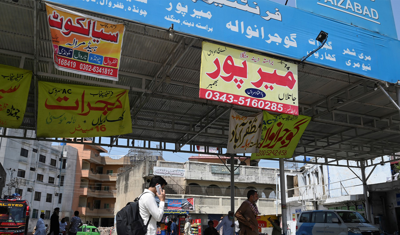 A man walks past an empty bus station in Islamabad, on April 10, 2021. (AFP/File)