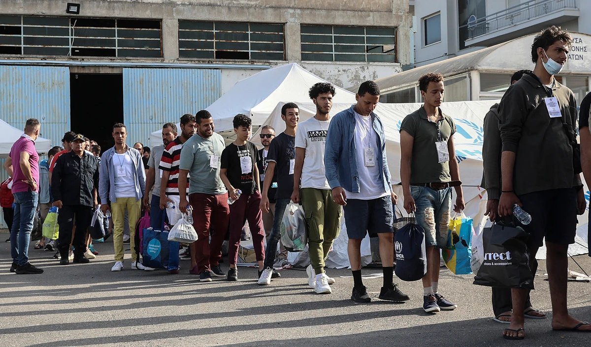 Survivors of latest tragical shipwreck prepare to board a bus to transfer to Athens at the port of Kalamata, Greece, on June 16, 2023. (InTime News via AP)