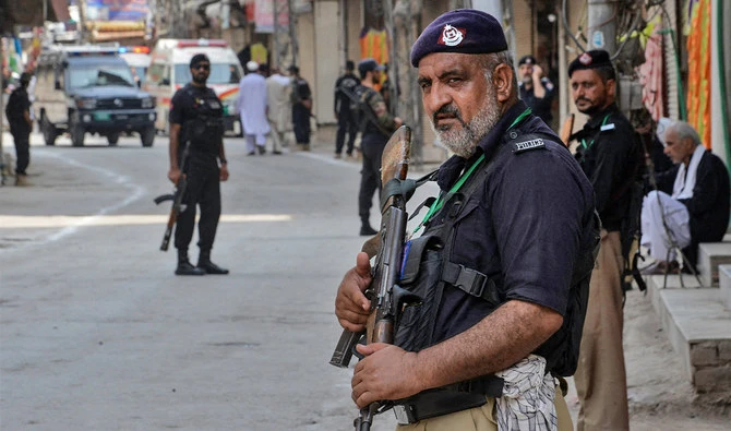 Police stands guard in Peshawar, Pakistan on August 7, 2022. (AFP/File)