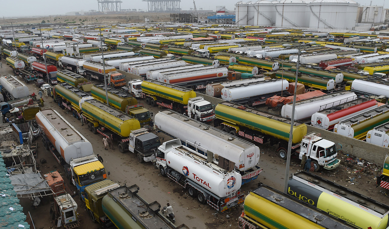 Oil tankers park in a terminal amid a countrywide strike by the All Pakistan Oil Tankers Association near a port in the Pakistani city of Karachi on July 26, 2017. (AFP/File)