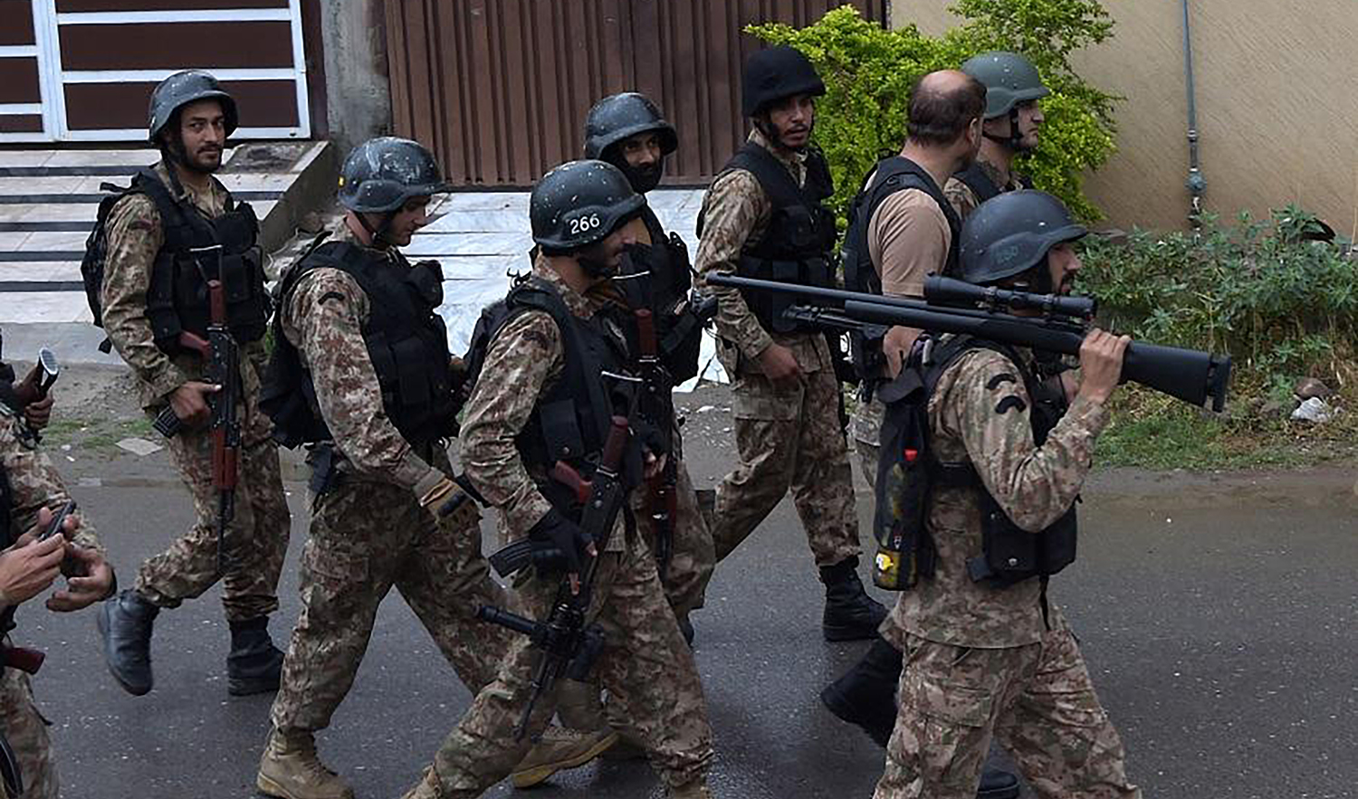 Pakistani soldiers walk from a site after an operation against suspected militants in Peshawar on April 16, 2019. (AFP/File)