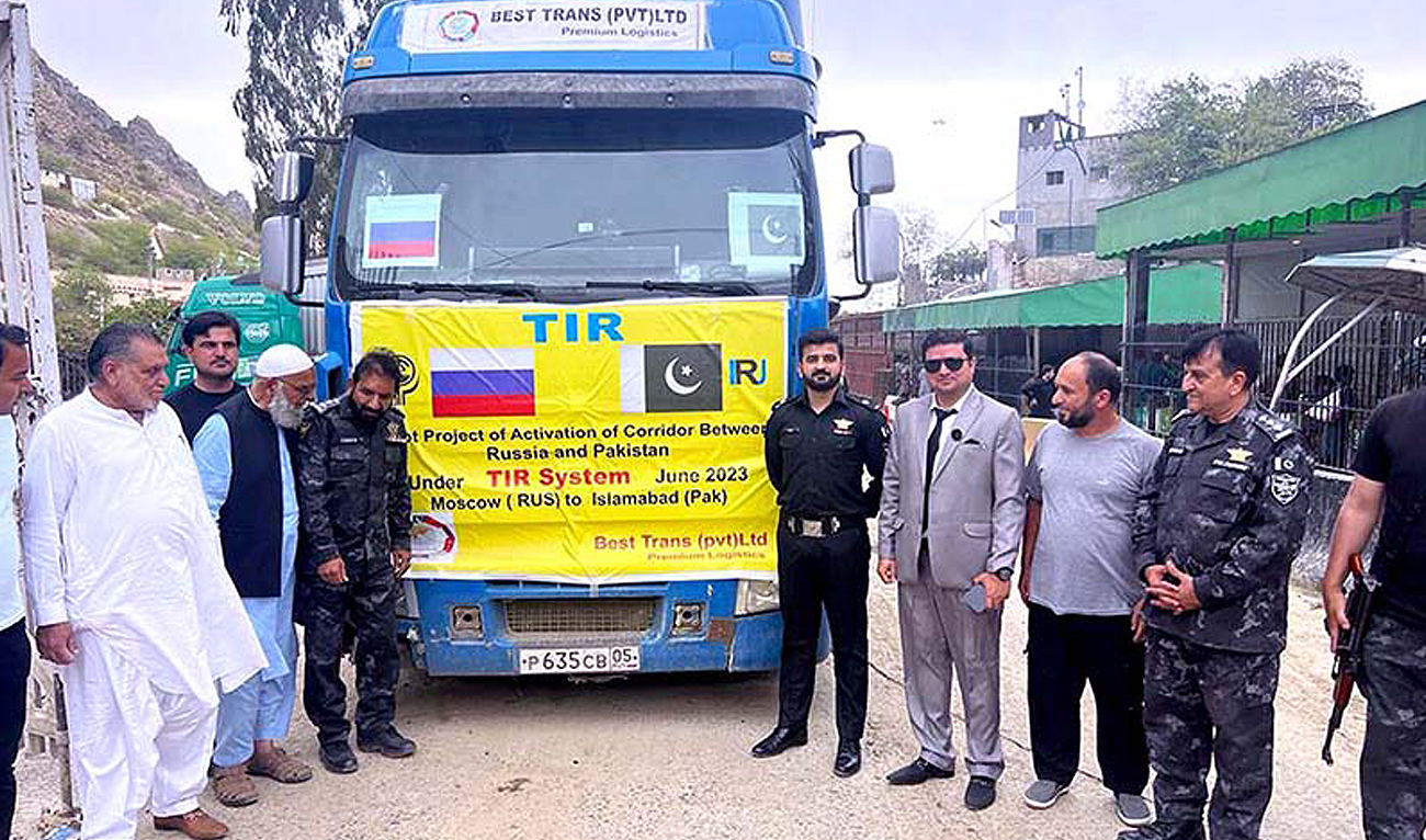 Pakistani officials receive the first truck of goods from Russia under the Transport International Routes (TIR) Convention at the Pakistan-Afghanistan Torkham border crossing in the Khyber Pakhtunkhwa province on July 9, 2023. (Photo courtesy: APP)