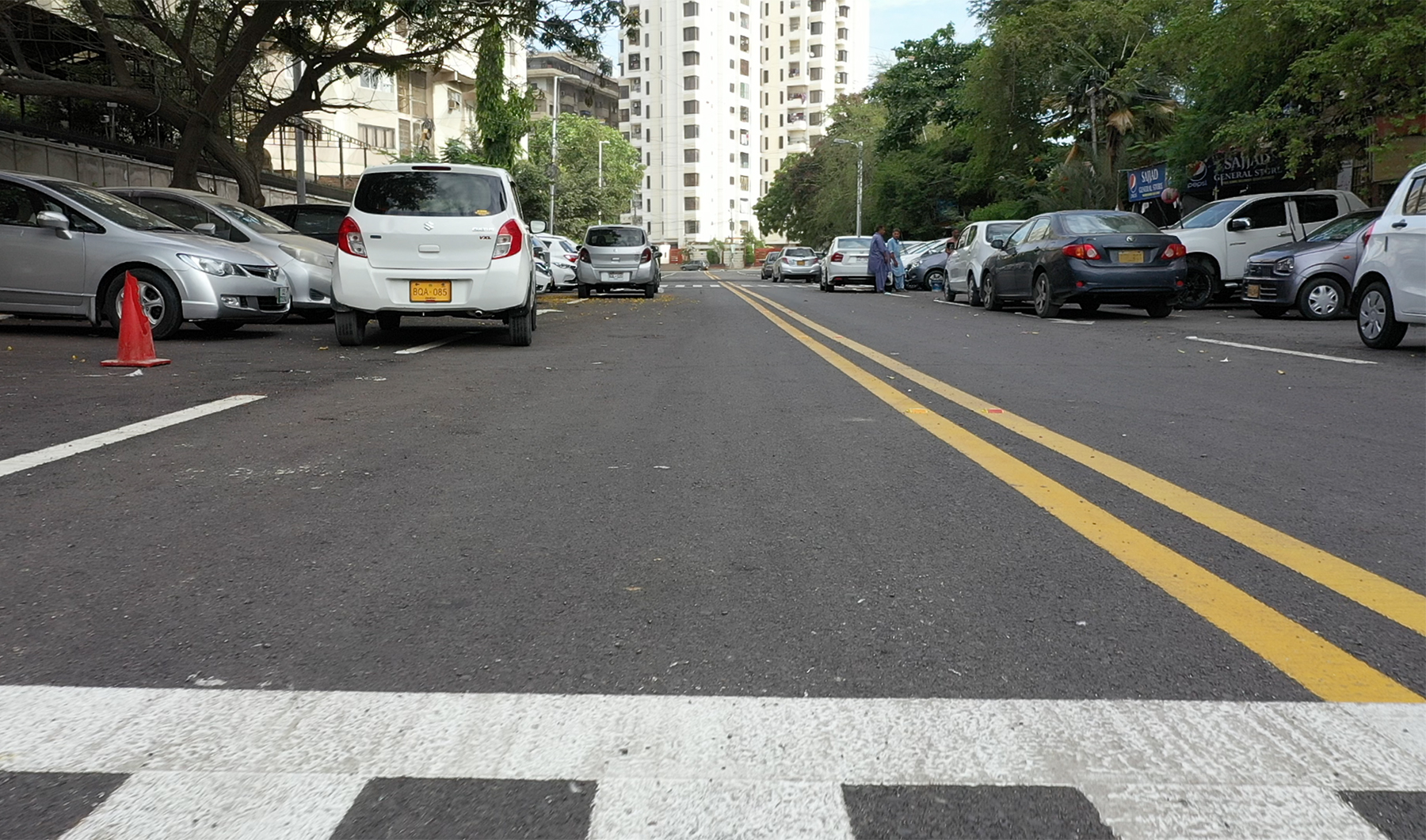 The still image taken on July 10, 2023, shows a road in Pakistan's Karachi city carpeted with recycled plastic waste. (Shell Pakistan)