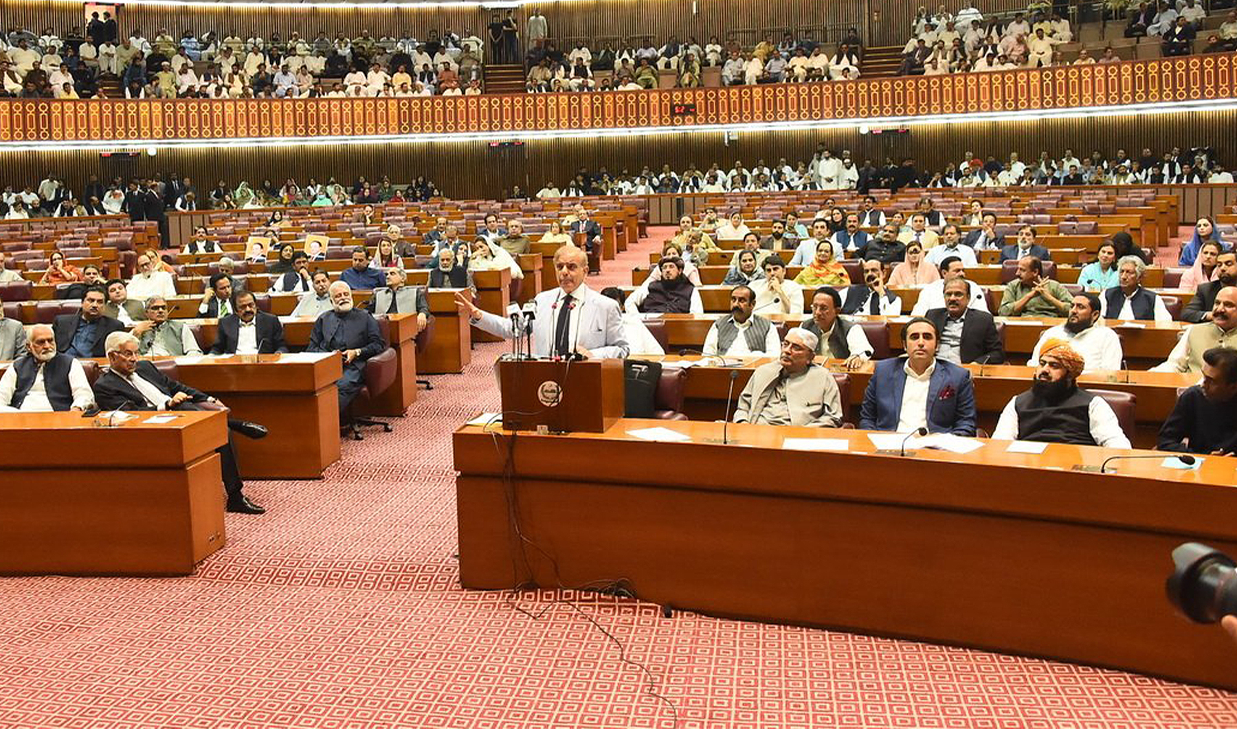 Pakistan's Prime Minister Shehbaz Sharif (center) addresses the National Assembly in Islamabad, Pakistan, on April 11, 2023. (@NAofPakistan/Twitter)