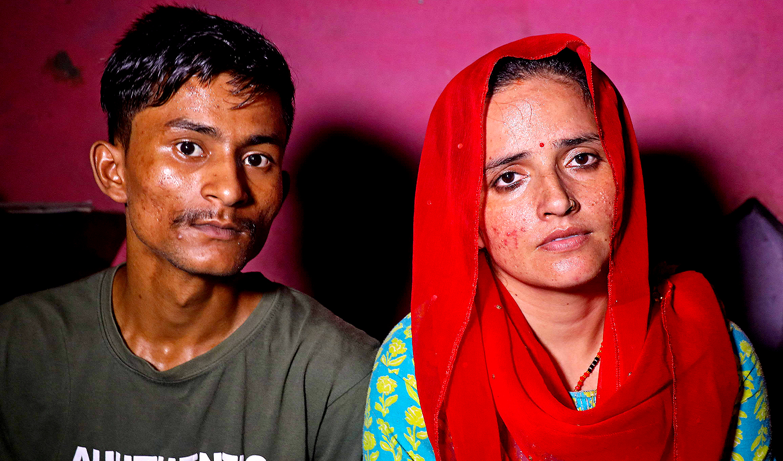 In this photograph taken on July 10, 2023, Sachin Meena (L) and Seema Haider attend an interview with AFP at their residence in Rabupura village, about 90 kms (55 miles) from New Delhi. (AFP)