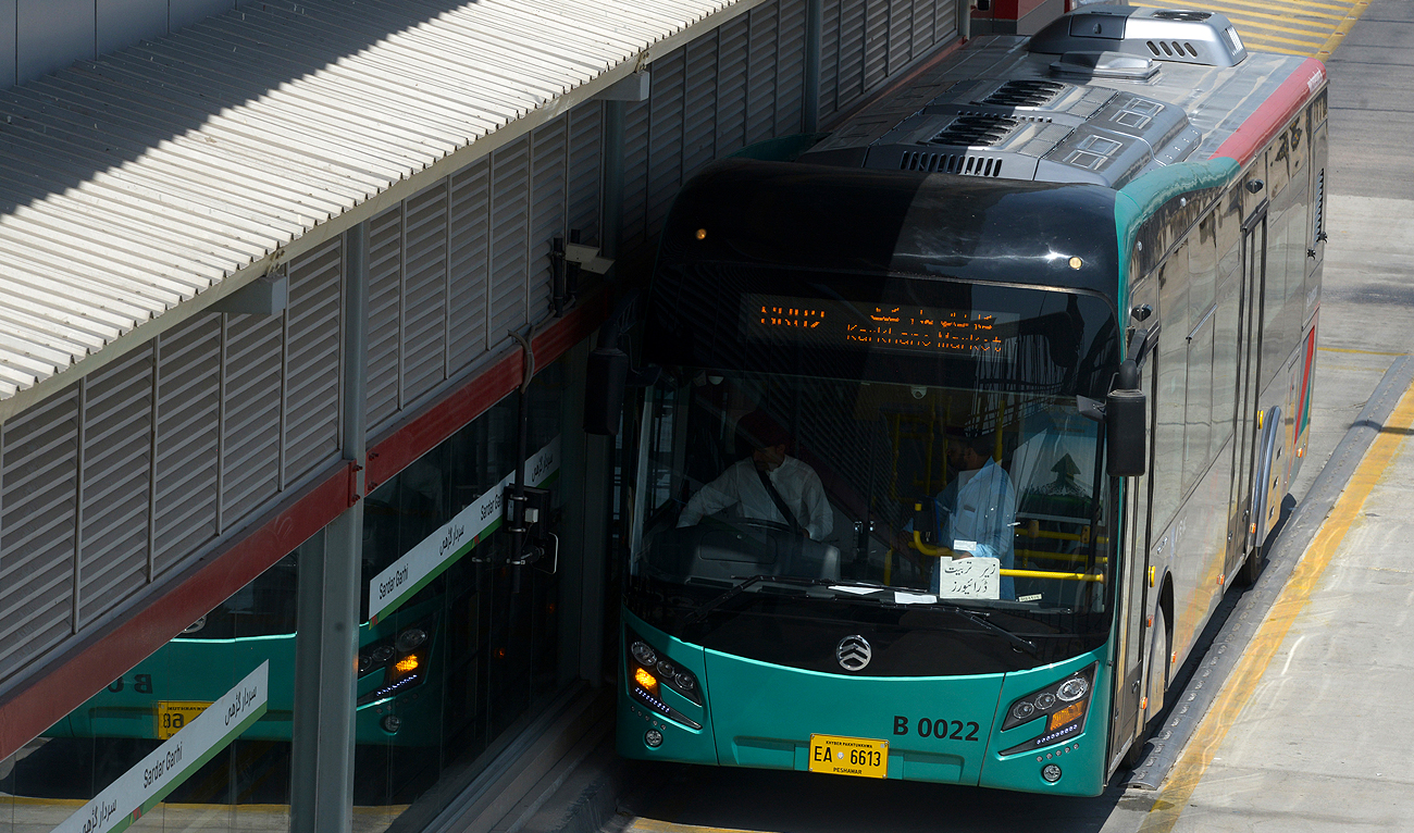 In this photo, taken on August 5, 2020, a bus stops at a terminal station of the Peshawar Bus Rapid Transit (BRT), a rapid bus transit system running along an east-west corridor in Peshawar. (AFP/File)