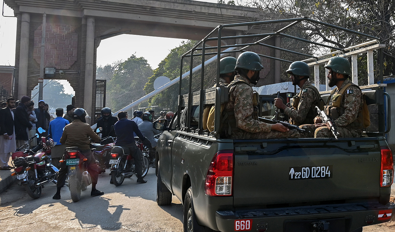 Pakistan's army soldiers patrol outside the police headquarters in Peshawar on January 31, 2023. (AFP/File)