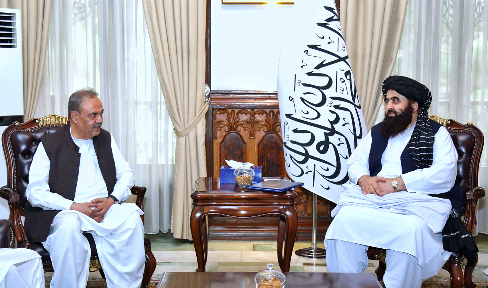 Pakistan's special envoy for Afghanistan Asif Durrani (left) calls on Afghan Foreign Minister Mawlawi Amir Khan Muttaqi in Kabul, Afghanistan, on July 19, 2023. (@QaharBalkhi/Twitter)