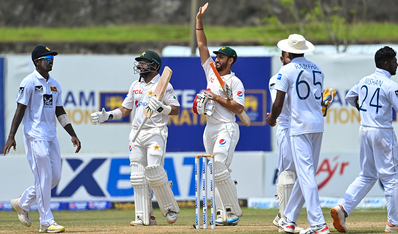 Pakistan's Imam-ul-Haq (2L) and Agha Salman (C) celebrate after Pakistan won by 4 wickets on the fifth and final day play of the first cricket Test match between Sri Lanka and Pakistan at the Galle International Cricket Stadium in Galle on July 20, 2023. (AFP)