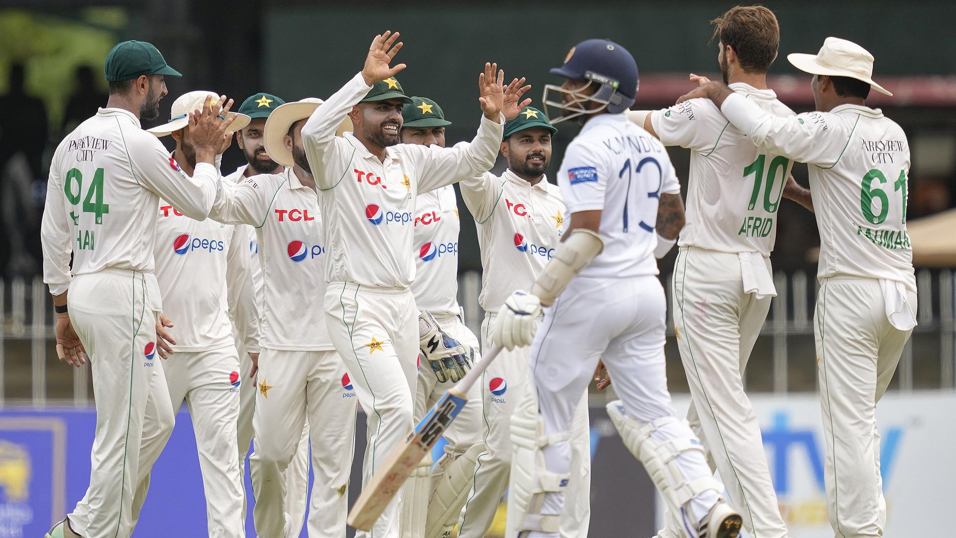 Pakistan's team members celebrate the dismissal of Sri Lanka's Kusal Mendis during the day one of the second cricket test match between Sri Lanka and Pakistan in Colombo, Sri Lanka on July 24, 2023. (AP)