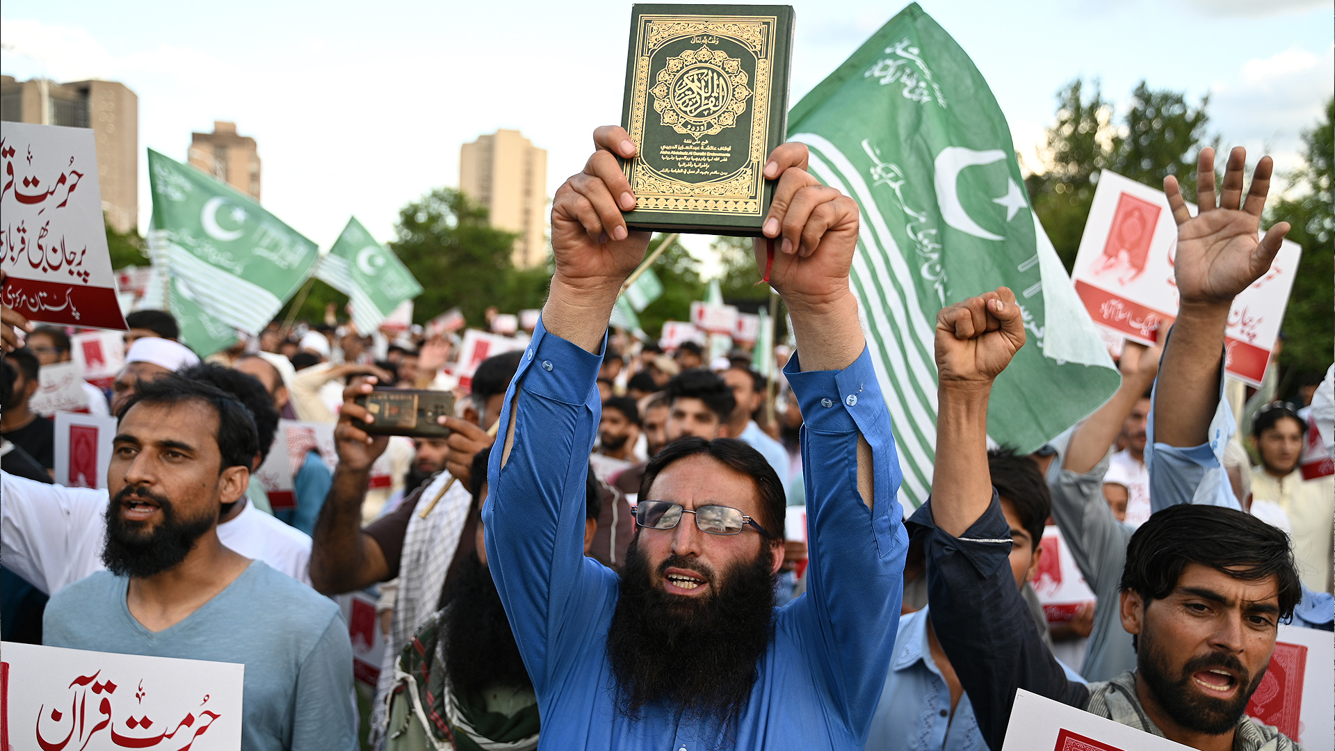 People shout anti-Sweden slogans in Islamabad on July 9, 2023, as they protest against the burning of the Qur'an outside a Stockholm mosque that outraged Muslims around the world. (AFP/File)