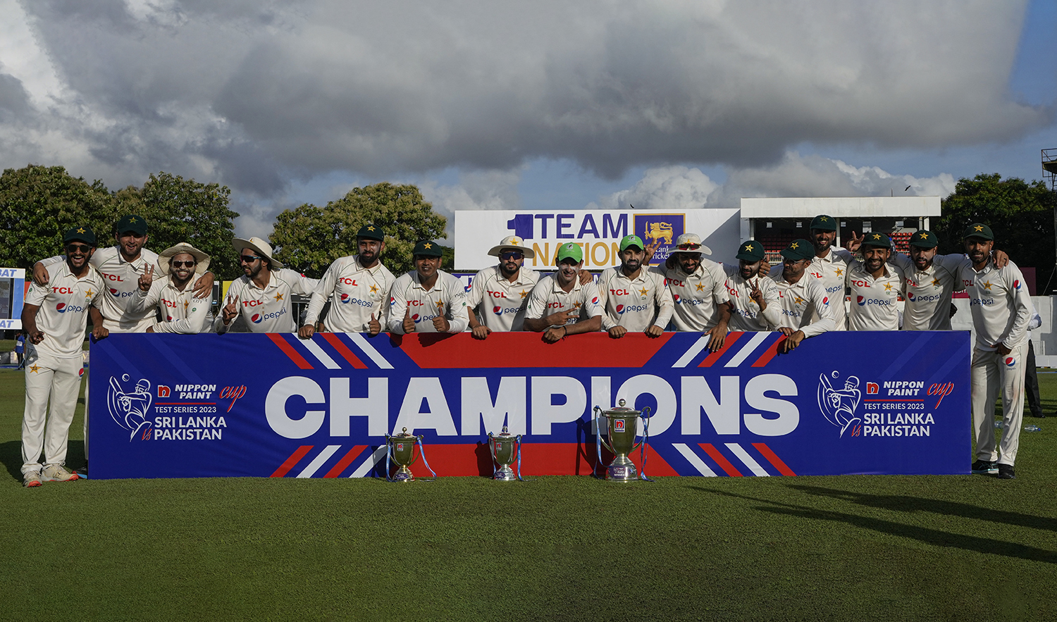 Pakistan cricket team poses with the trophy after beating Sri Lanka by an innings and 222 runs in Colombo, Sri Lanka on July 27, 2023. (AP)