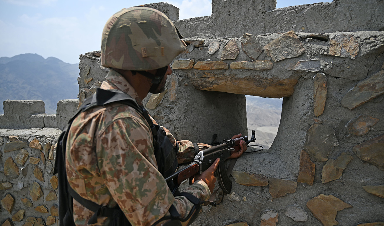 A Pakistani army soldier mans a position at the Pakistan-Afghanistan border near Big Ben post in Khyber district in Khyber Pakhtunkhwa province August 3, 2021. (AFP/File)