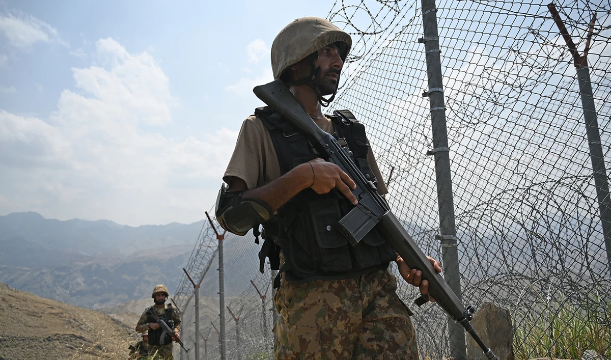 Pakistani troops patrol along Pakistan-Afghanistan border at Big Ben post in Khyber district in Khyber Pakhtunkhwa province August 3, 2021. (AFP/File)