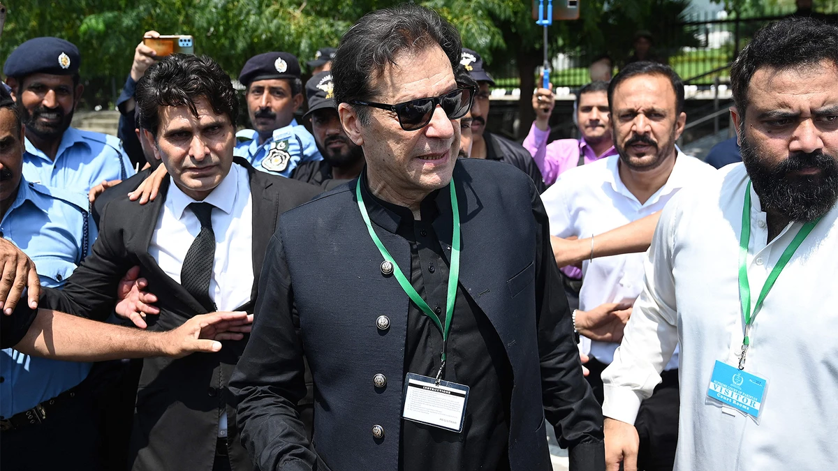 Pakistan’s former Prime Minister Imran Khan (C) leaves after appearing in the Supreme Court in Islamabad on July 24, 2023. (AFP)
