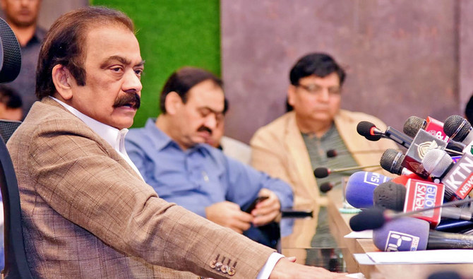 Pakistan's interior minister Rana Sanaullah (left) addresses a press conference in Islamabad, Pakistan, on October 29, 2022. (Photo courtesy: PID)