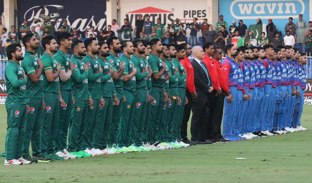 Afganistan's and Pakistan's (L) players line up for their national anthems before the start of the Asia Cup Twenty20 international cricket Super Four match between Afghanistan and Pakistan at the Sharjah Cricket Stadium in Sharjah on September 7, 2022. (AFP/File)
