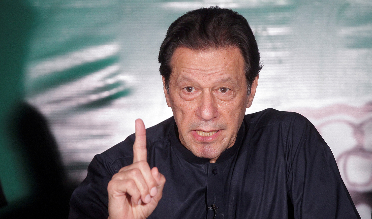 Pakistan's former Prime Minister Imran Khan, gestures as he speaks to the members of the media at his residence in Lahore, Pakistan on May 18, 2023. (REUTERS/File)