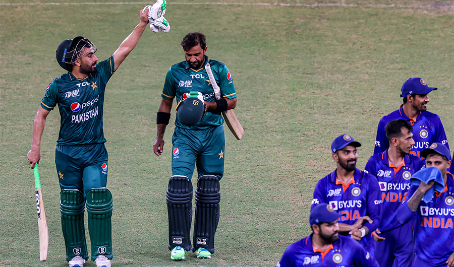 Pakistan's Khushdil Shah (L) celebrates with teammate Iftikhar Ahmed after their win at the end of the Asia Cup Twenty20 international cricket Super Four match between India and Pakistan at the Dubai International Cricket Stadium in Dubai on September 4, 2022. (AFP/File)