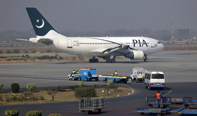 In this file photo, a Pakistan International Airlines (PIA) plane prepares to take-off at Alama Iqbal International Airport in Lahore on Feb. 1, 2012. (REUTERS)