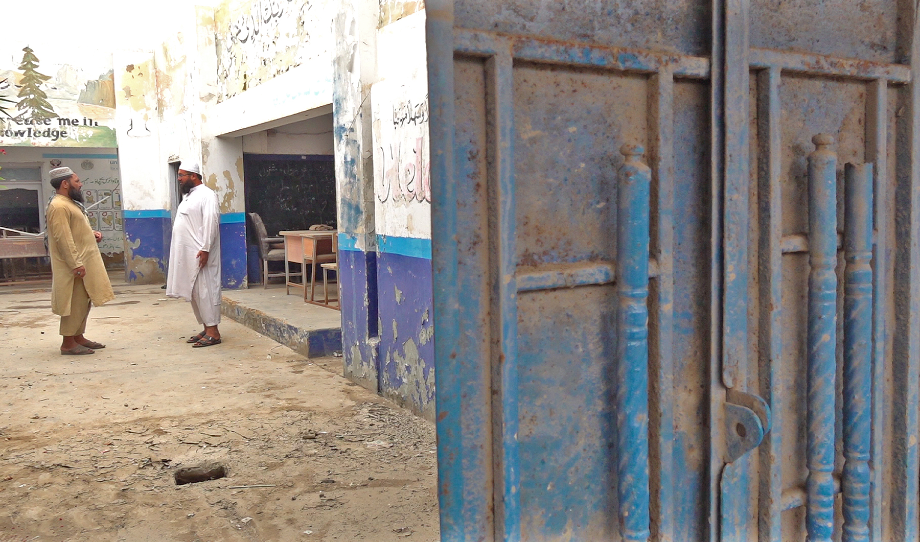 Habib-ur-Rehman (right), principal of Ghazi Amanullah Khan High School, talks to a staff member is Karachi, Pakistan, on August 16, 2023. (AN photo)