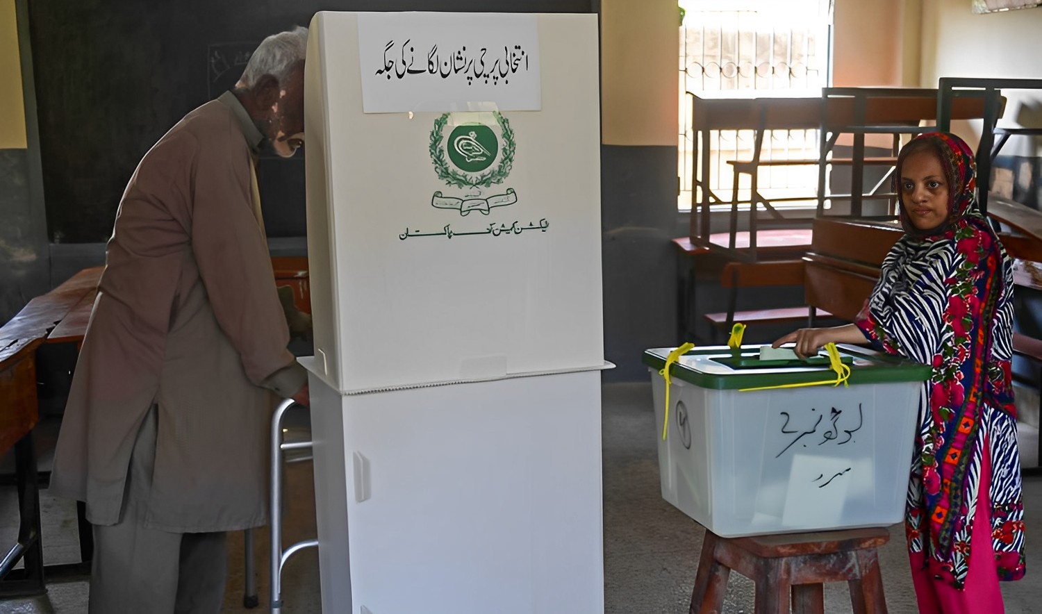 Voters cast their ballot at a polling station during the by-election for national assembly seats, in Karachi, Pakistan on October 16, 2022. (AFP/File)