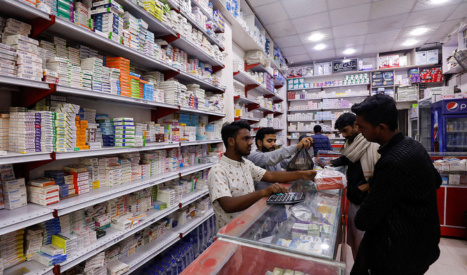 This photo, taken on February 9, 2023, customers buy medicine from a medical supply store in Karachi, Pakistan. (REUTERS/File)
