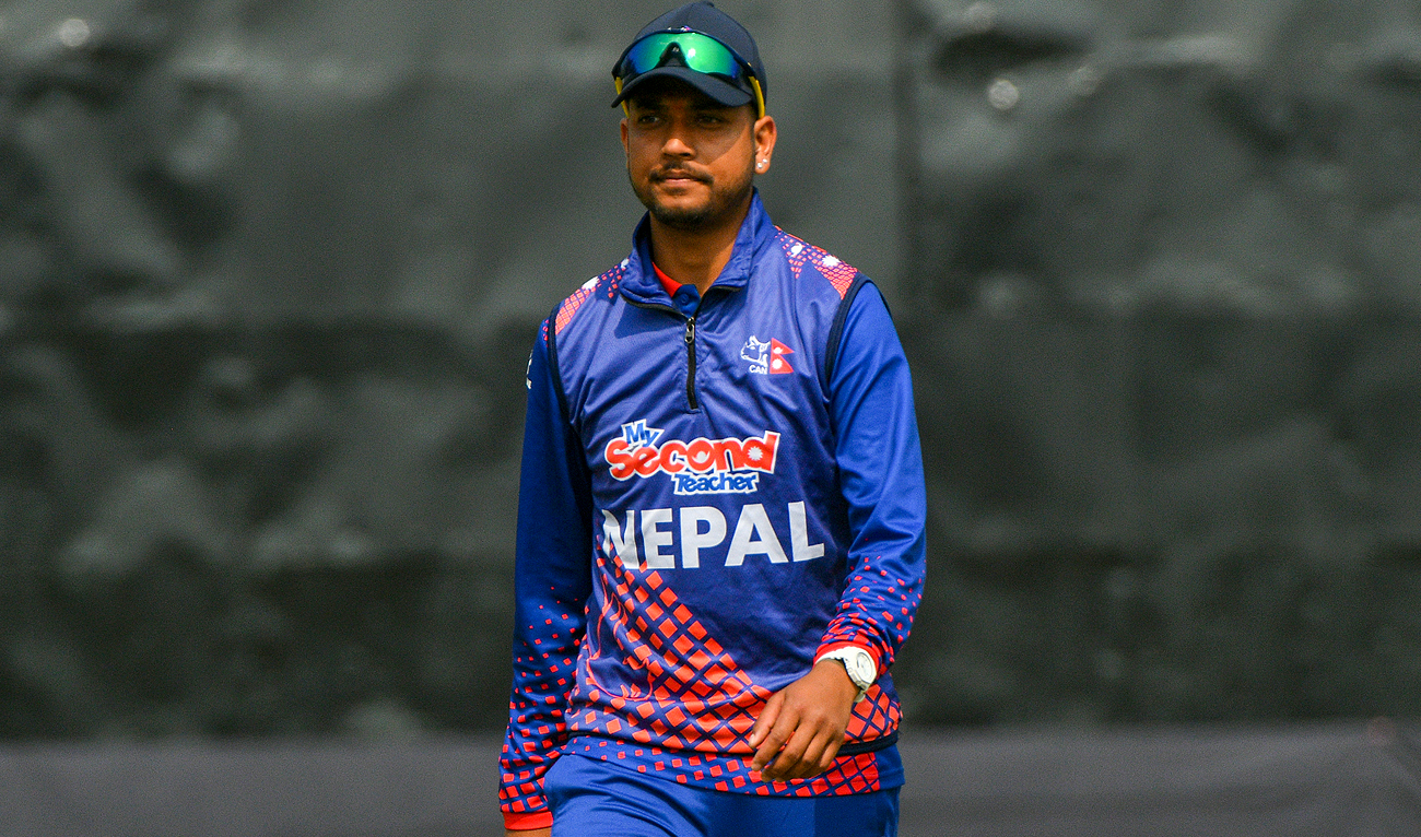 Nepal's cricketer Sandeep Lamichhane walks during the ICC Men's Cricket World Cup League 2 match between Nepal and Scotland at the Tribhuvan University International Cricket Ground in Kathmandu on February 21, 2023. (AFP/File)