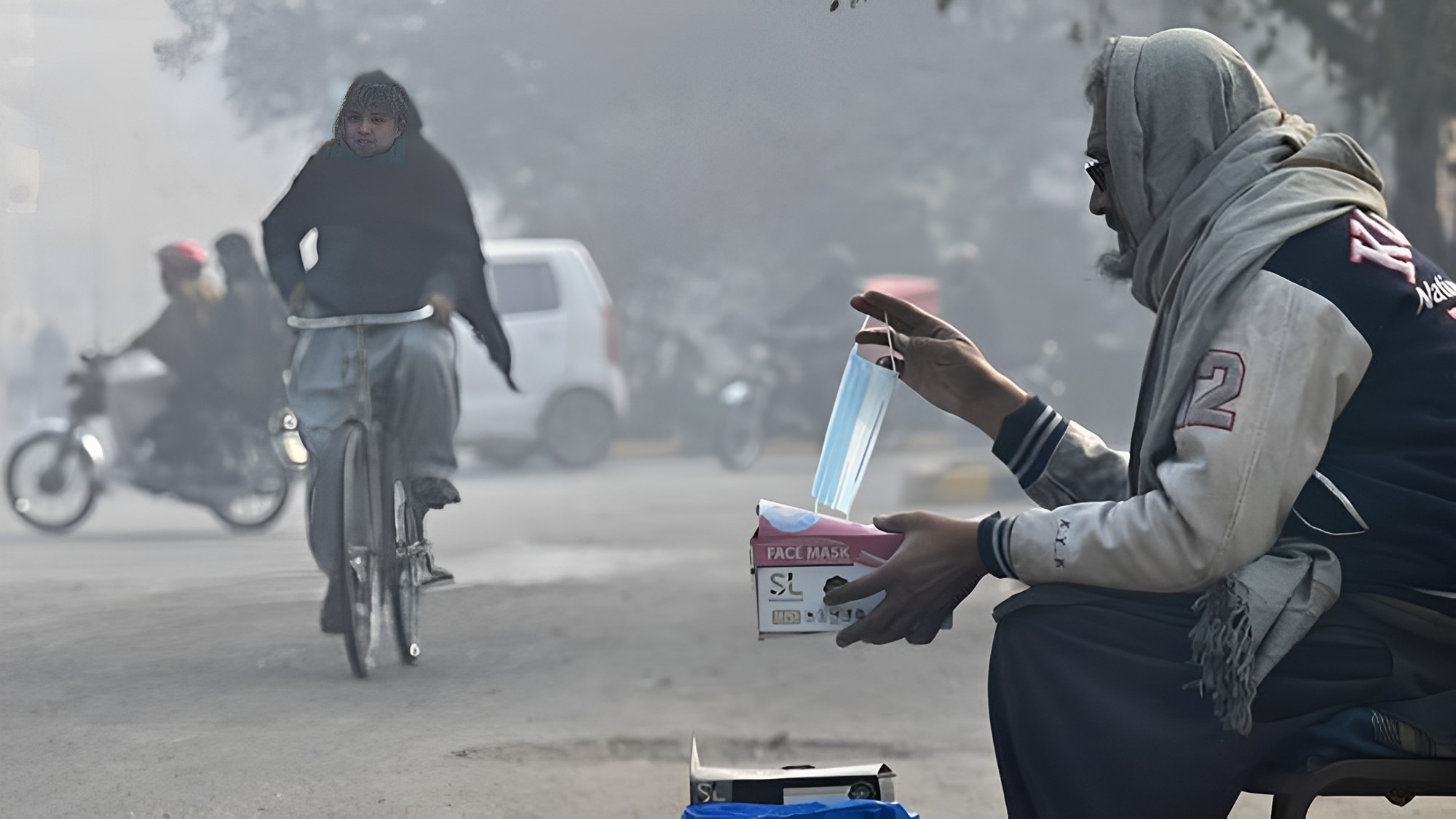 A vendor sells face masks on a street amid heavy smog conditions in Lahore, Pakistan on December 28, 2022. (AFP/File)