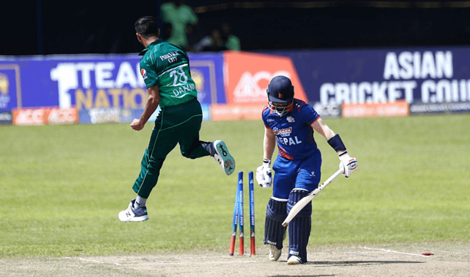 Pakistan's Shahnawaz Dahani, left, celebrates after taking a wicket during a cricket match against Nepal during ACC Men's Emerging Cup in Colombo on July 14, 2023. (Photo courtesy: social media)