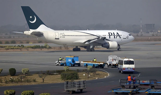 In this file photo, a Pakistan International Airlines (PIA) plane prepares to take-off at Alama Iqbal International Airport in Lahore on Feb. 1, 2012. (REUTERS)