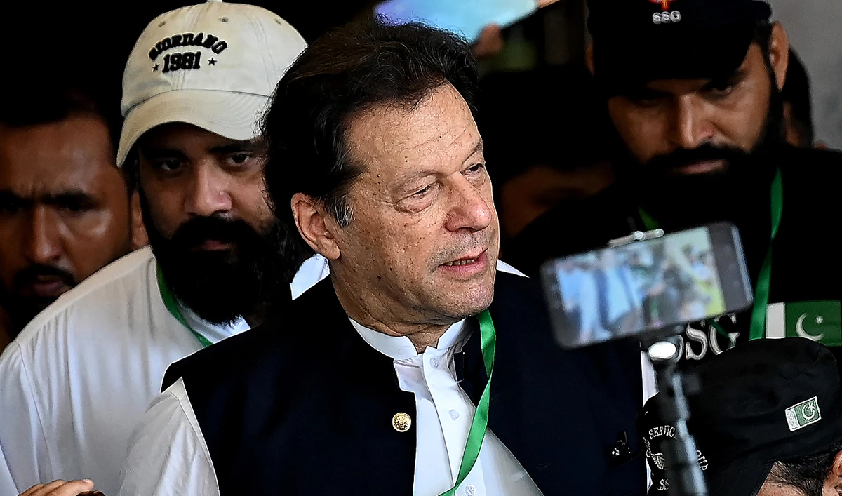 In this picture, taken on July 26, 2023, Pakistan's former Prime Minister Imran Khan (C) leaves after appearing in the Supreme Court in Islamabad. (AFP/File)