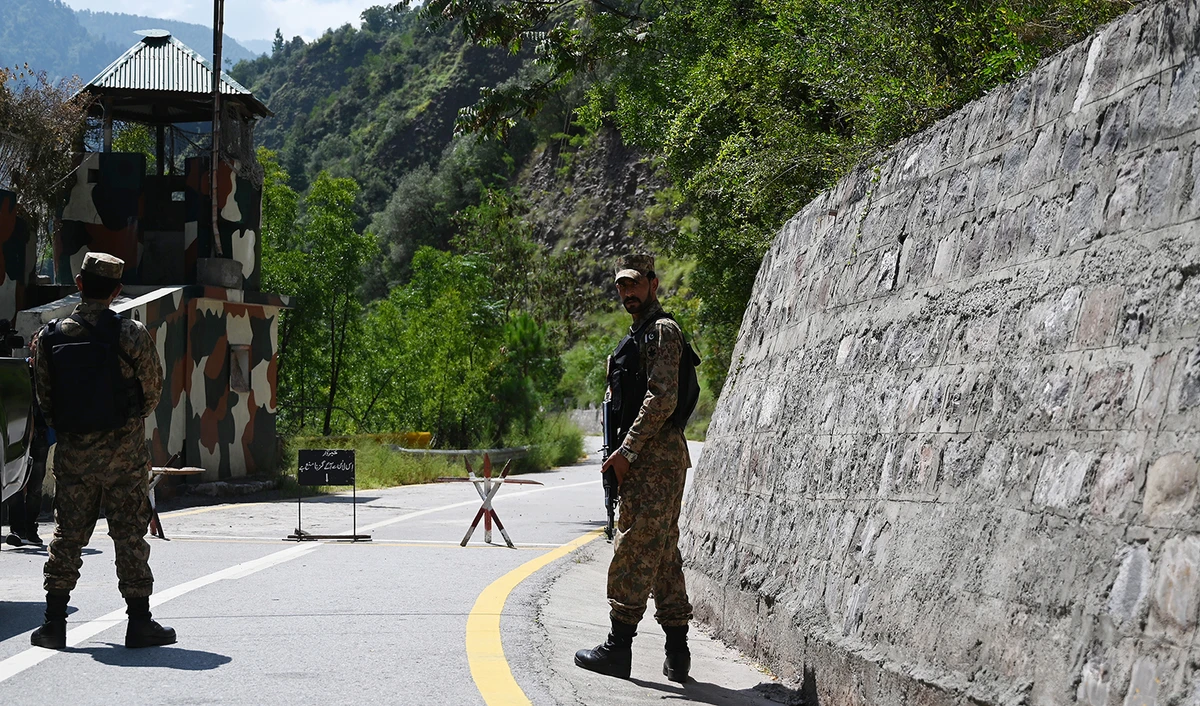This representational photo shows Pakistani troops patrol at the Line of Control (LoC) --- the de facto border between Pakistan and India -- in Chakothi sector, in Pakistan-administered Kashmir on August 29, 2019. (AFP/File)