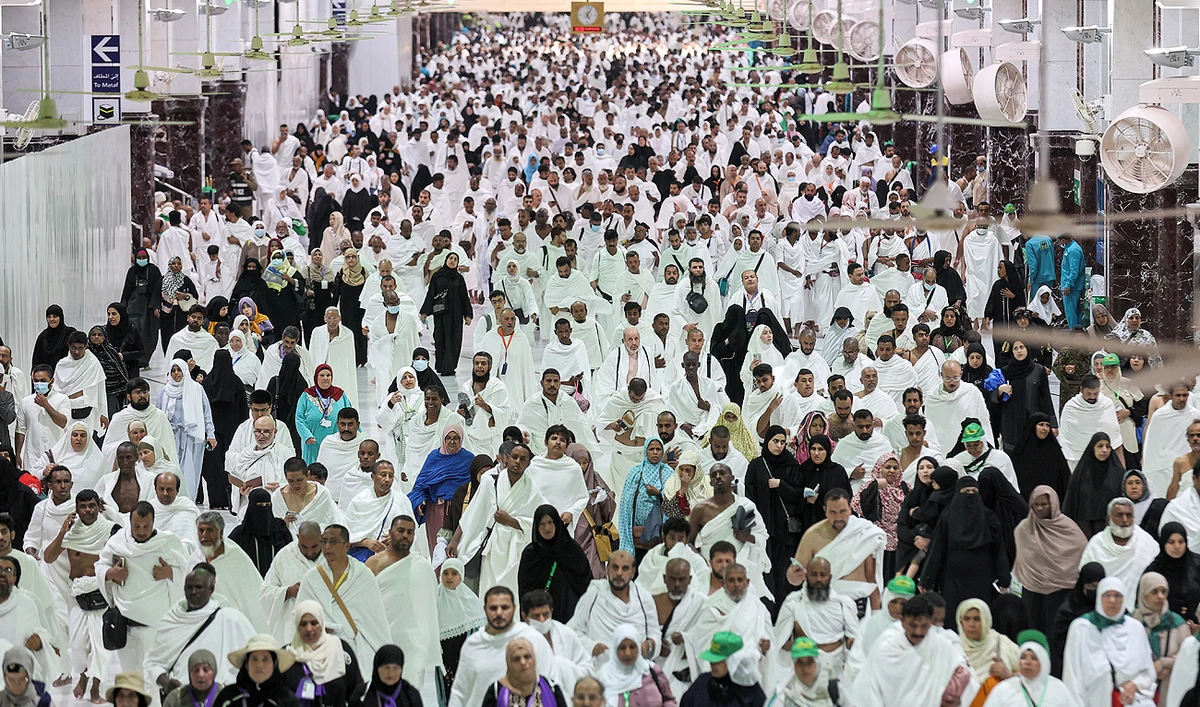 Muslim worshippers performing the "Umrah" pilgrimage walk between the Marwa and Safa hills at the Grand Mosque in the holy city of Mecca on March 23, 2023. (AFP/File)