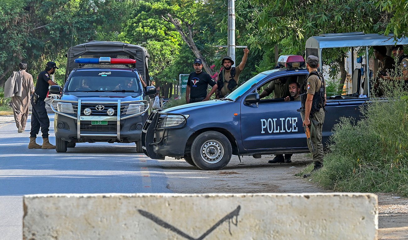 Security personnel stand guard at the Attock prison post where Pakistan's former Prime Minister Imran Khan remains imprisoned despite receiving bail in Attock on August 29, 2023. (AFP/File)