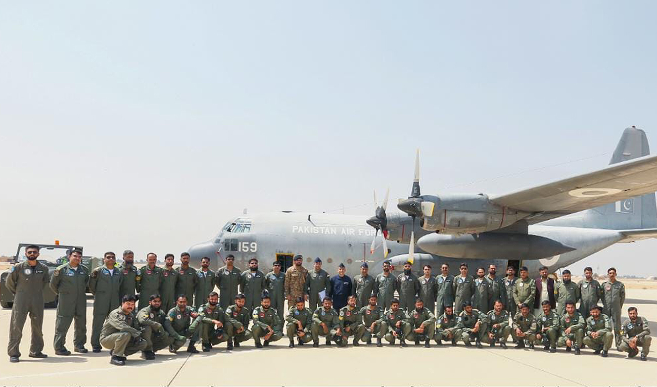 A group of Pakistan Air Force air and ground crew is seen posing for a photo next to an aircraft in Egypt on September 2, 2023. (Photo courtesy: Pakistan Air Force)
