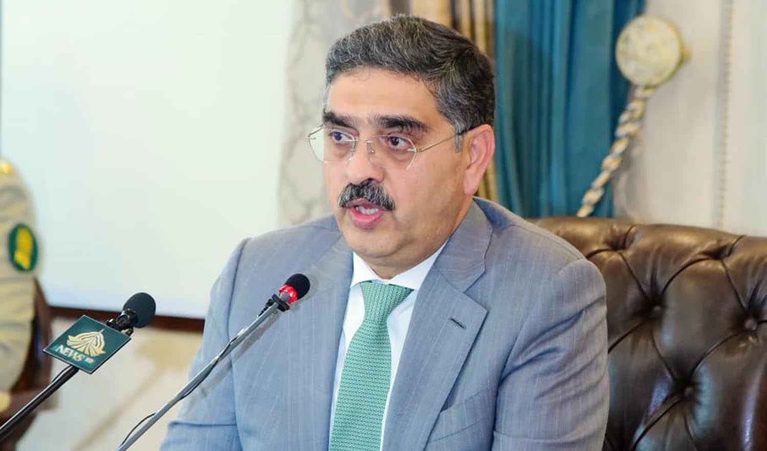 Pakistan's Caretaker Prime Minister Anwaar-ul-Haq Kakar interacts with foreign media in Islamabad on September 4, 2023. (PID)