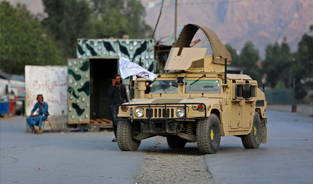 A humvee (HMMWV) vehicle is seen near the closed gates of Torkham border crossing between Afghanistan and Pakistan in Afghanistan's eastern Nangarhar province on September 6, 2023. (AFP)