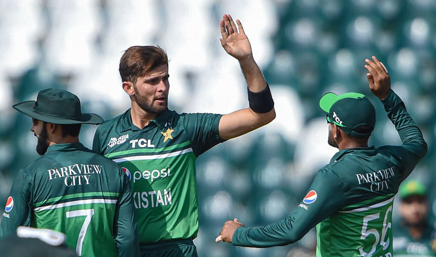 Pakistan's Shaheen Shah Afridi, center, celebrates with teammates after taking the wicket of Bangladesh's Litton Das during the Asia Cup 2023 one-day international (ODI) cricket match at the Gaddafi Stadium in Lahore on September 6, 2023. (AFP)