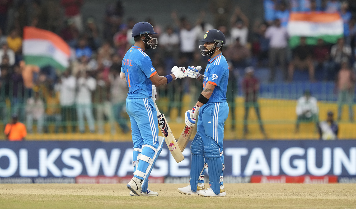 India's KL Rahul, left, and Virat Kohli cheer each others during the Asia Cup cricket match between India and Pakistan in Colombo, Sri Lanka on September 11, 2023. (AP)