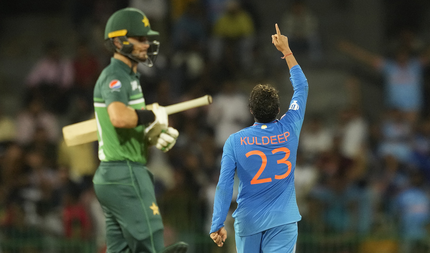 India's Kuldeep Yadav celebrates the wicket of Pakistan's Faheem Ashraf during the Asia Cup cricket match in Colombo, Sri Lanka on September 11, 2023. (AP)