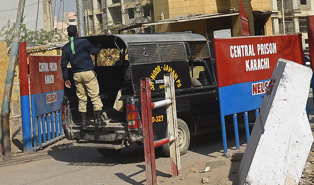 In this file photo, taken on January 30, 2021, a police vehicle enters the central prison in Karachi. (AFP/File)