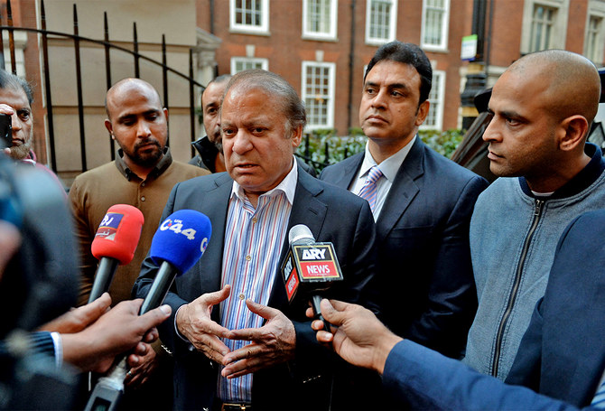 Former Prime Minister of Pakistan, Nawaz Sharif (C) interacts with the media in central London, UK, on November 1, 2017. (AFP/File)