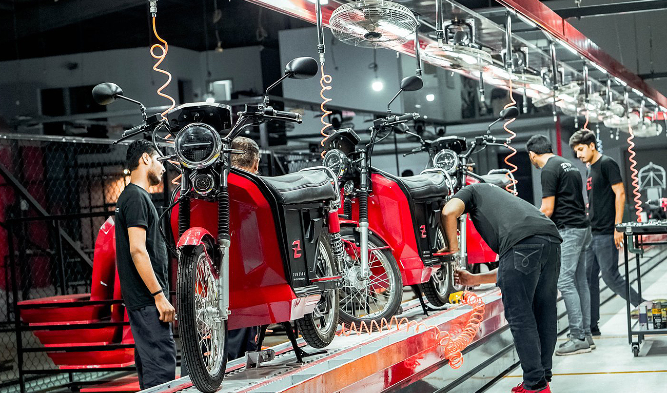 This undated photo shows employees working on an Electric Bike assembly line at the Zyp Technologies facility in Lahore. (Photo courtesy: Zyp Technologies)
