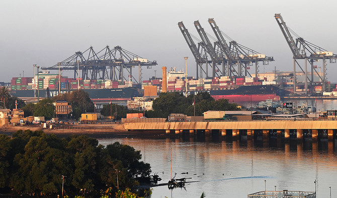 Shipping containers are seen stacked on a ship at a sea port in Karachi on April 6, 2023. (AFP)