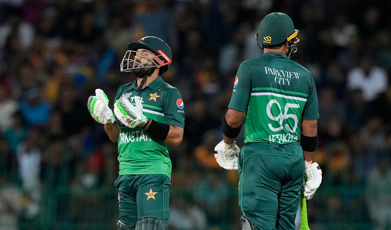 Pakistan's Mohammad Rizwan celebrates scoring a half century as Iftikhar Ahmed watches during the Asia Cup cricket match between Pakistan and Sri Lanka in Colombo, Sri Lanka on Thursday, Sept.14, 2023. (AP)