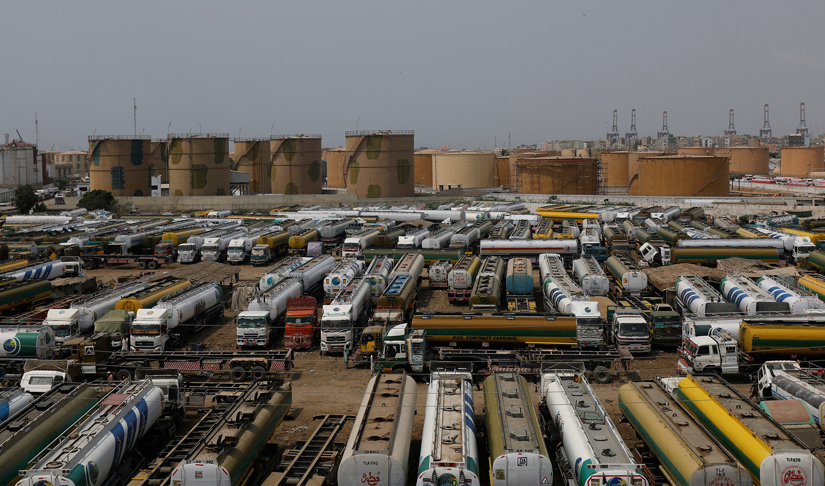 Oil tankers are seen parked, following the protest by the All Pakistan Oil Tankers Owners Association, demanding the hike in fares, expansion of quota in onshore white pipeline transportation and permit to use old vehicles, in Karachi, Pakistan on September 19, 2023. (REUTERS)